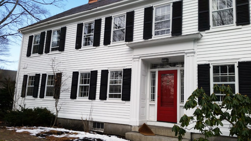  front entry sidelights and rectangular transoms were probably installed in the early Greek Revival era,